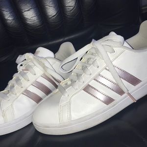 Metallic rose gold adidas cloudfoam sneakers